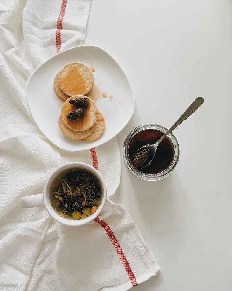 Pine cone jam jar with red hat made in Ukraine